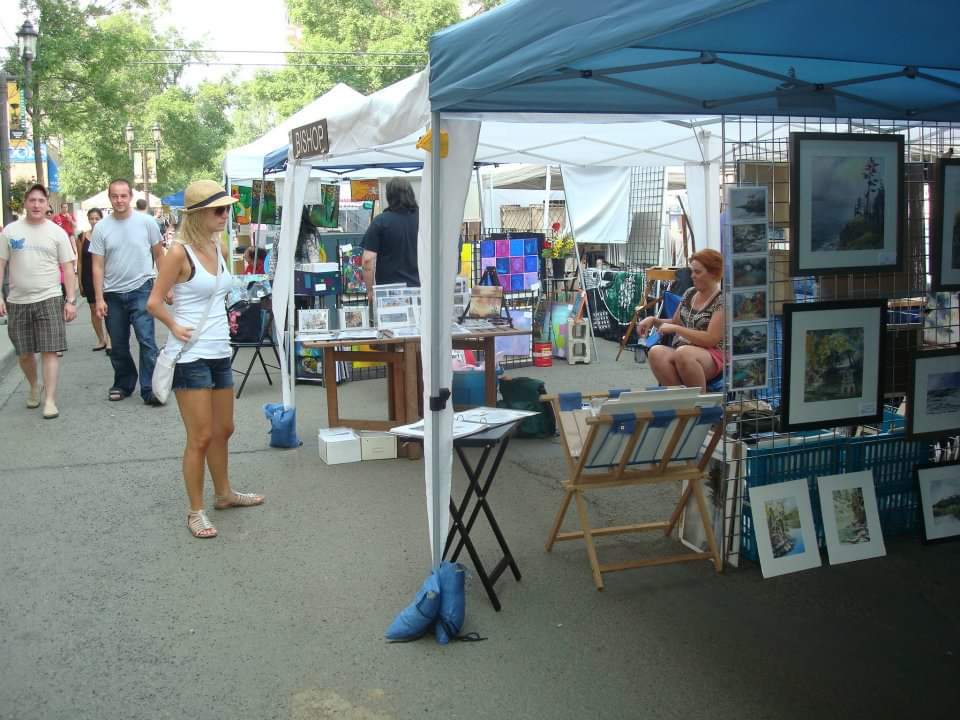 Image of artist tents and patrons browsing